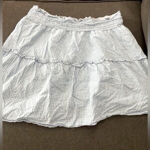 Light blue and white skirt.